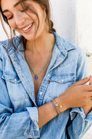 Gigi Clozeau necklaces and bracelets. 18 carat gold in all colors of the rainbow. Diamonds and classic chains.